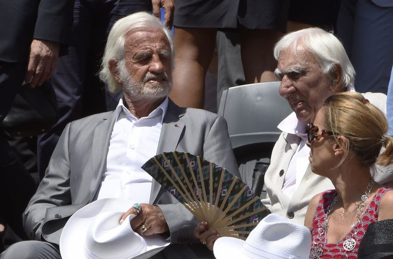 Le rendez-vous des légendes : Jean-Paul Belmondo et Charles Gérard, les patrons des tribunes de Roland-Garros. 